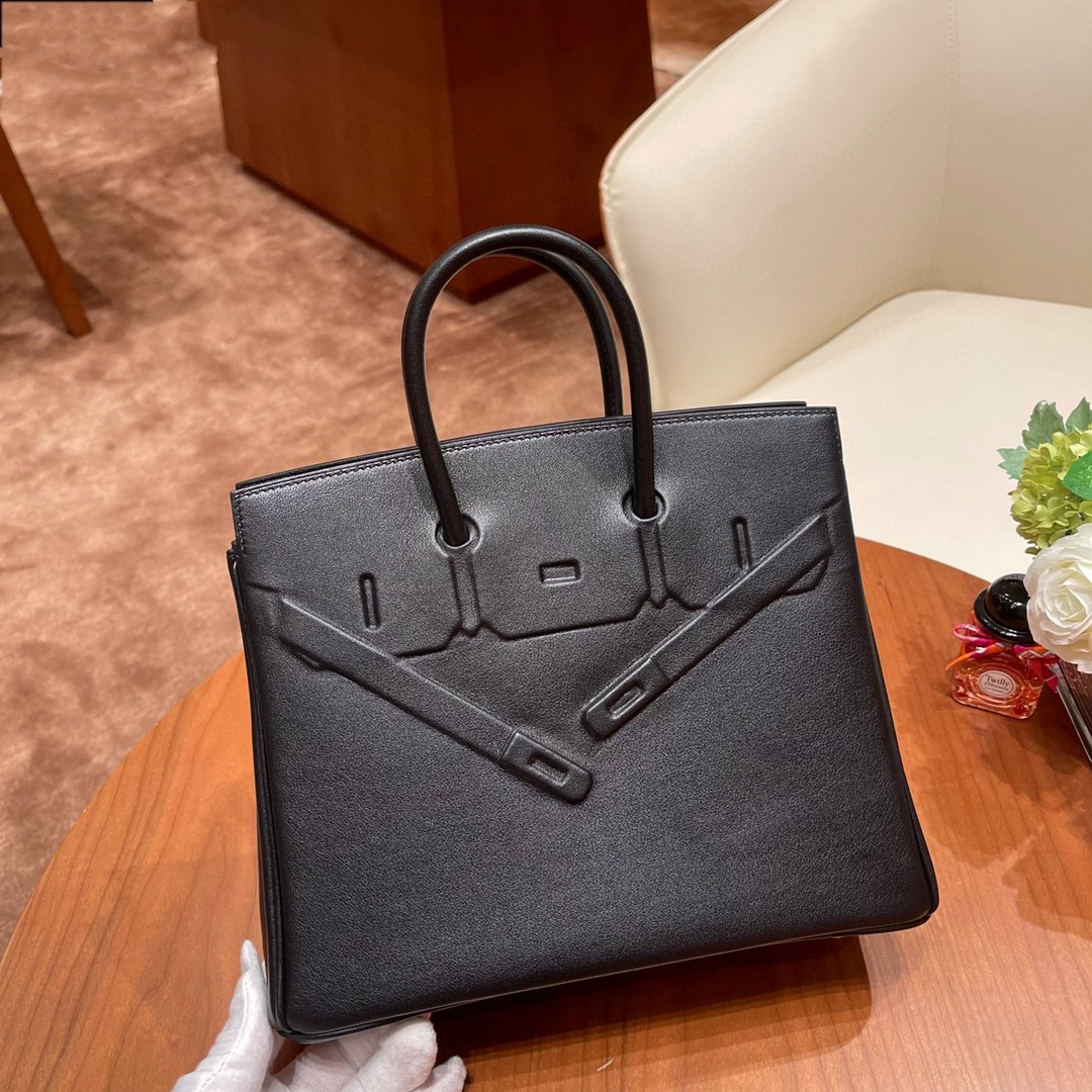 爱马仕 25cm shadow 幻影包 一款外表没有五金的幻影包，外观非常特别，把birkin 的元素都都用浮雕方式保留下了 swift 皮 89 黑色