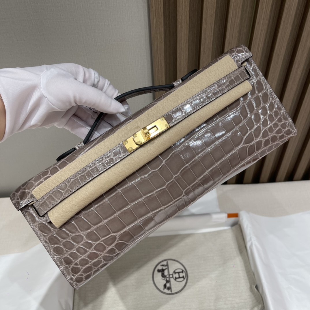 HERMES 爱马仕 Kelly Cut 31cm 尼罗鳄Niloticus 亮面 刻两点•• 81 斑鸠灰Gris Tourterelle 进口蜜蜡线 全手工制作