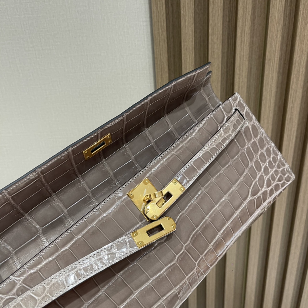 HERMES 爱马仕 Kelly Cut 31cm 尼罗鳄Niloticus 亮面 刻两点•• 81 斑鸠灰Gris Tourterelle 进口蜜蜡线 全手工制作